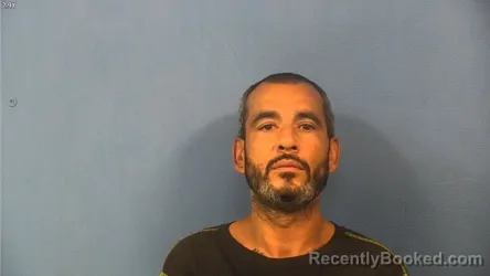 Mugshot of Carlos Santiago booked in DuPage County, Illinois on October 13, 2026