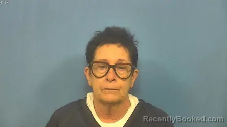 Mugshot of Donna Mikson booked in DuPage County, Illinois on August 9, 2026