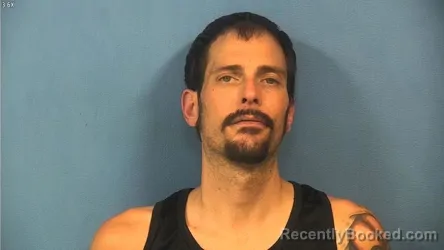 Mugshot of David Thomas booked in DuPage County, Illinois on August 4, 2026