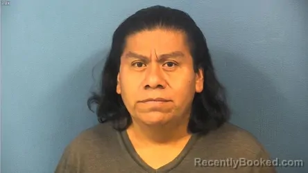 Mugshot of Elias Ixtapan-Belli booked in DuPage County, Illinois on August 13, 2026