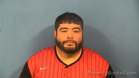 Mugshot of Eduardo Ruacho booked in DuPage County, Illinois on September 22, 2026