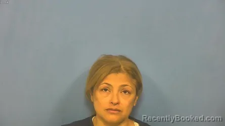 Mugshot of HERICA MARTINEZ OSPINA booked in DuPage County, Illinois on April 6, 2026