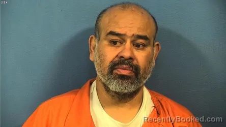 Mugshot of JOSUE BRENES