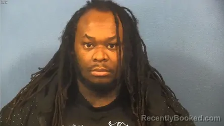Mugshot of Justin Crutcher booked in DuPage County, Illinois on August 11, 2026