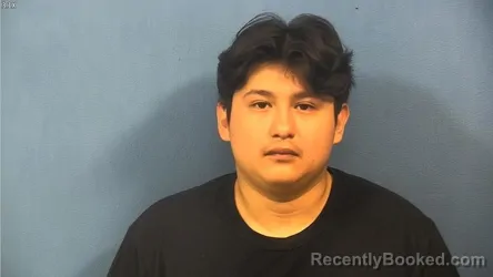 Mugshot of Jonathan Gonzalez Rogel booked in DuPage County, Illinois on August 12, 2026