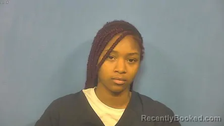 Mugshot of Janasija Russell booked in DuPage County, Illinois on August 16, 2026