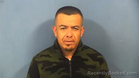 Mugshot of Jose Rebollo Vazquez booked in DuPage County, Illinois on October 12, 2026