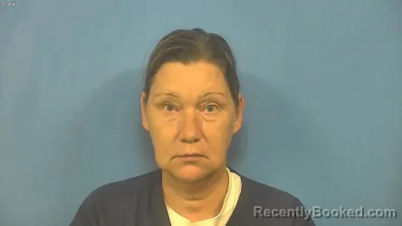 Mugshot of KIMBERLY HESS booked in DuPage County, Illinois on June 9, 2026