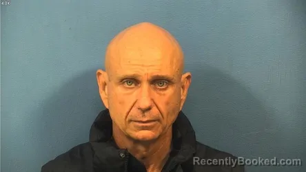 Mugshot of KRISTOPHER KANE booked in DuPage County, Illinois on April 21, 2026