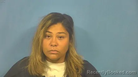 Mugshot of MARIA AGUADO booked in DuPage County, Illinois on June 24, 2026