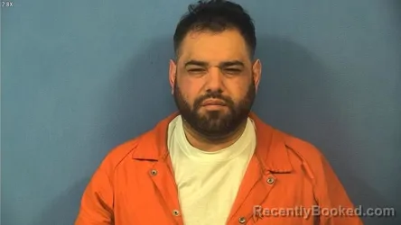 Mugshot of MIGUEL BRICENO booked in DuPage County, Illinois on April 10, 2026