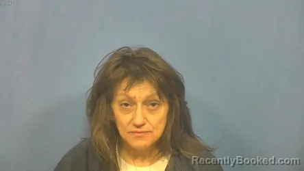 Mugshot of Michelle Calomino booked in DuPage County, Illinois on August 9, 2026