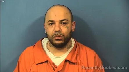 Mugshot of MIGUEL FIGUEROA booked in DuPage County, Illinois on April 13, 2026