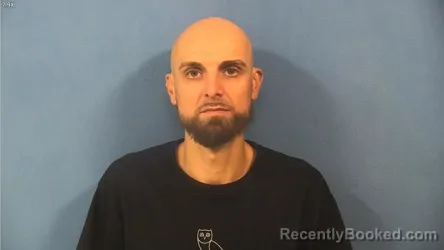 Mugshot of Marek Gilinski booked in DuPage County, Illinois on October 12, 2026