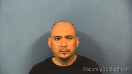 Mugshot of Mario Negron booked in DuPage County, Illinois on August 6, 2026