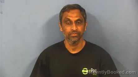 Mugshot of MIR RAZVI booked in DuPage County, Illinois on May 31, 2026