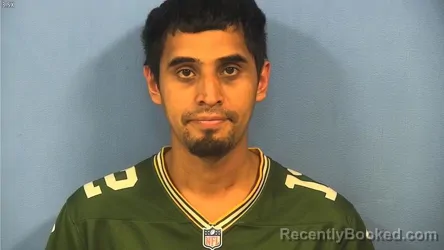 Mugshot of Manuel Reyes booked in DuPage County, Illinois on July 31, 2026