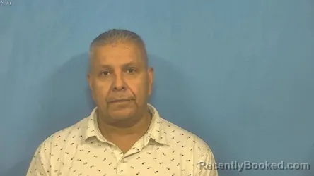 Mugshot of Ronald Martinez booked in DuPage County, Illinois on July 28, 2026