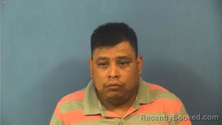 Mugshot of Sergio Colesio Rosales booked in DuPage County, Illinois on July 24, 2026