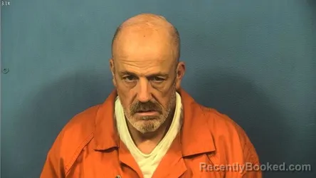 Mugshot of Talmas Elliott booked in DuPage County, Illinois on August 6, 2026
