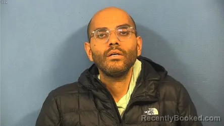 Mugshot of TAREK HASSABALLA booked in DuPage County, Illinois on April 18, 2026