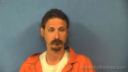 Mugshot of TARAS KURIY booked in DuPage County, Illinois on April 15, 2026