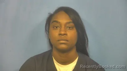 Mugshot of TANIKA MOORE booked in DuPage County, Illinois on April 4, 2026