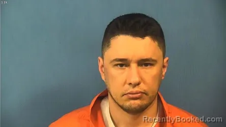 Mugshot of VIKTOR KOTSYULYM booked in DuPage County, Illinois on April 18, 2026