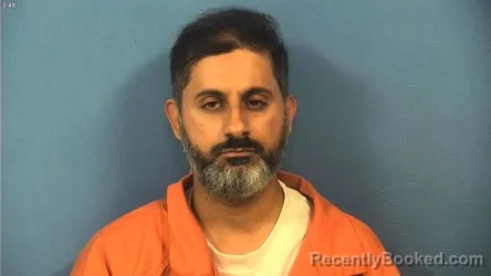 Mugshot of Wassam Ashraf booked in DuPage County, Illinois on August 1, 2026