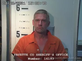 Mugshot of RYAN N RENSING