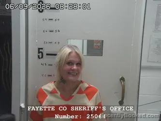 Mugshot of CASEY LOU KRUMMEL booked in Fayette County, Illinois on June 9, 2026