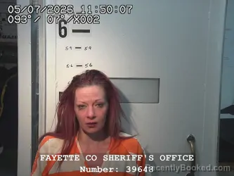 Mugshot of AMBER MARIE WOOLSEY booked in Fayette County, Illinois on May 7, 2026