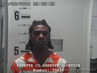 Mugshot of TYRIC ANDREW HOLLINS booked in Fayette County, Illinois on March 25, 2026