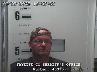 Mugshot of ERIC MICHAEL HUTCHINSON booked in Fayette County, Illinois on March 25, 2026