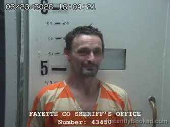 Mugshot of JAMES R CHARBONEAU booked in Fayette County, Illinois on March 23, 2026