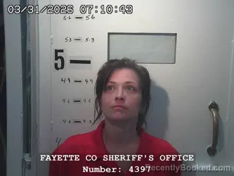 Mugshot of AMBERLY DAWN WELLS booked in Fayette County, Illinois on March 31, 2026