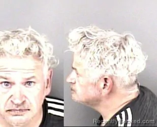 Mugshot of Jonathan Lynn Burrow booked in Gaston County, North Carolina on August 9, 2026