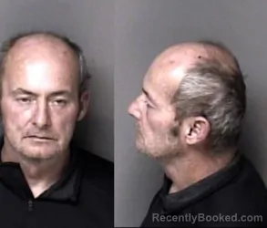 Mugshot of Eugene Thomas Revis