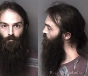 Mugshot of Russell Allen Lewis booked in Gaston County, North Carolina on August 9, 2026