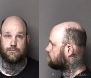 Mugshot of Christopher Derrick Hopkins booked in Gaston County, North Carolina on May 23, 2026