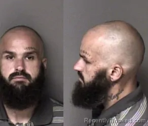 Mugshot of Christopher Michael Rue booked in Gaston County, North Carolina on August 11, 2026