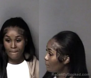 Mugshot of Raynisha Joy Outlaw booked in Gaston County, North Carolina on October 21, 2026