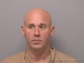 Mugshot of DUSTIN D HOLLAND