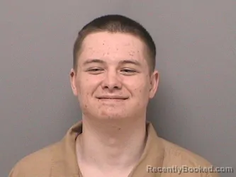 Mugshot of DUSTIN M REED