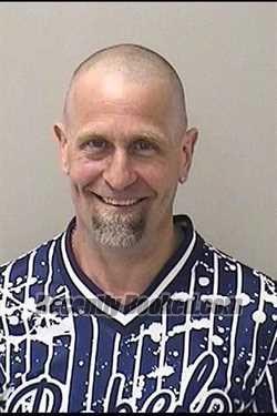 Booking photo from Kane County, Illinois