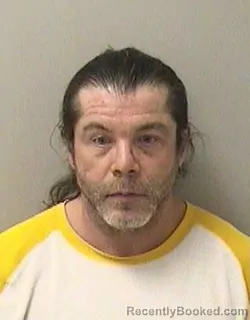 Booking photo from Kane County, Illinois