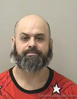 Booking photo from Kane County, Illinois