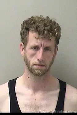 Booking photo from Kane County, Illinois