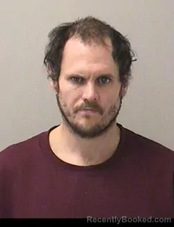 Mugshot of CHARLES JOSEPH NEWCOMB