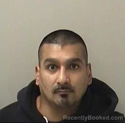 Mugshot of ANDREW BUENO